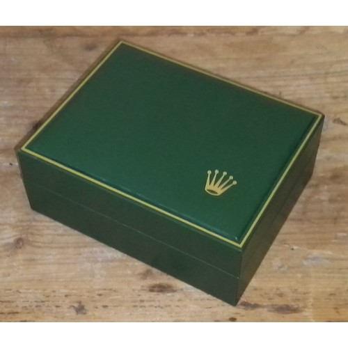 62 - A vintage green gilt green leather Rolex watch box and papers.