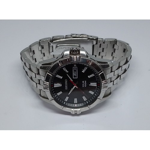 63 - A Seiko Solar 100m quartz wristwatch.