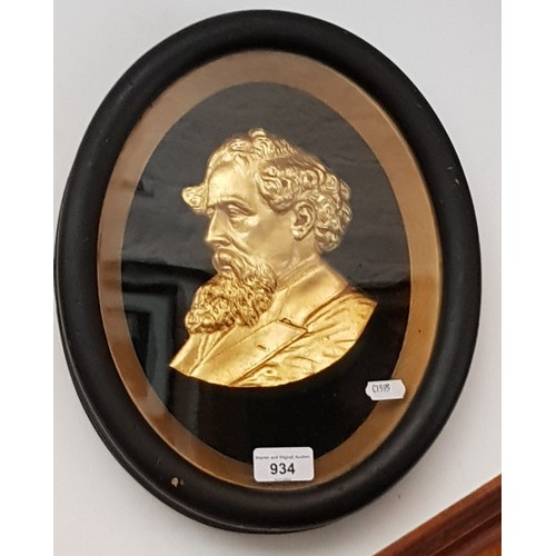 934 - A late 19th/early 20th century framed gilt metal portrait of Charles Dickens, 27cm x 34cm overall.