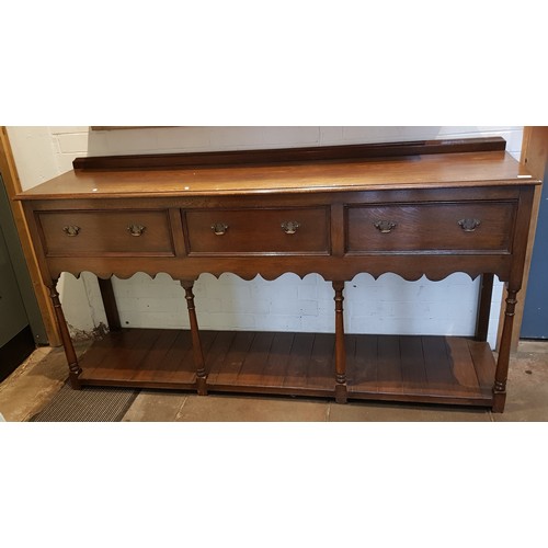 944 - A Georgian style oak sideboard/dresser base, length 186cm.