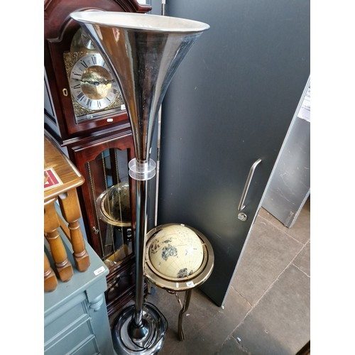 948 - An Art Deco large metal floor standing lamp.