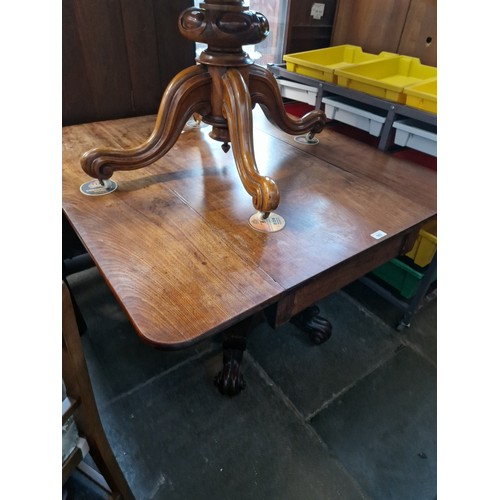 985 - A 19th century mahogany pedestal Pembroke table.