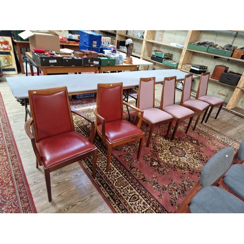 980 - A mid 20th century G Plan teak extending dining table and 6 chairs (2 x carver).