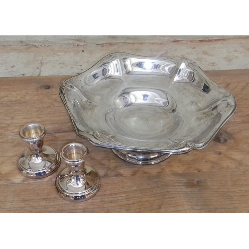 78 - Hallmarked silver comprising a pedestal dish weight 11.9ozt and a pair of hallmarked silver candlest... 