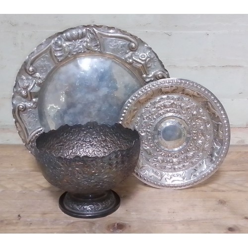 88 - Three pieces of eastern white metal comprising a pedestal bowl and two plates, gross wt. 890g.