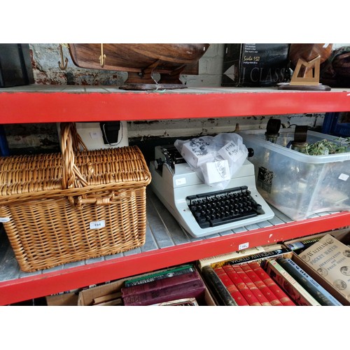 194 - A mixed lot comprising Imperial typewriter, wicker basket, waste paper bin, light bulbs and a box of... 