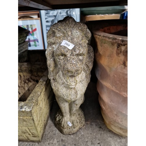 260 - Two garden ornaments in the form of lions.