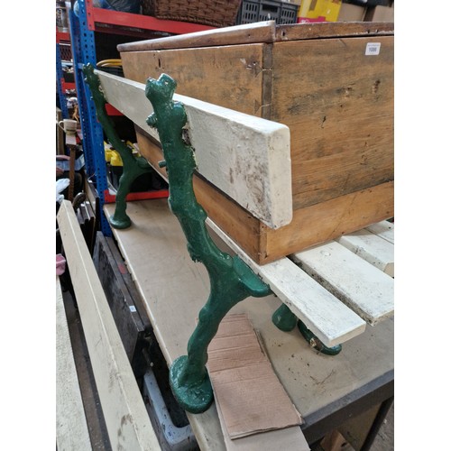 264 - A heavy duty garden bench on cast supports