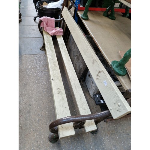 263 - A heavy duty garden bench on cast supports