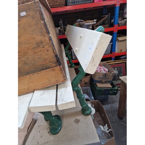 265 - A heavy duty garden bench on cast supports