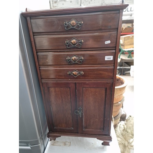 1085 - An Edwardian mahogany music cabinet.