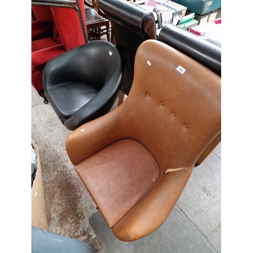 1092 - Two retro swivel chairs.