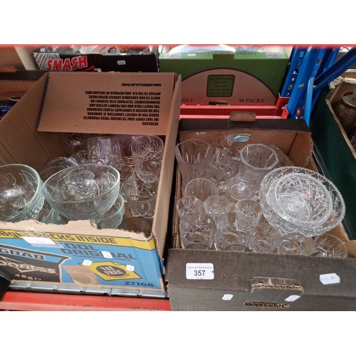 357 - 2 boxes of glass ware including drinking glasses and sundae dishes