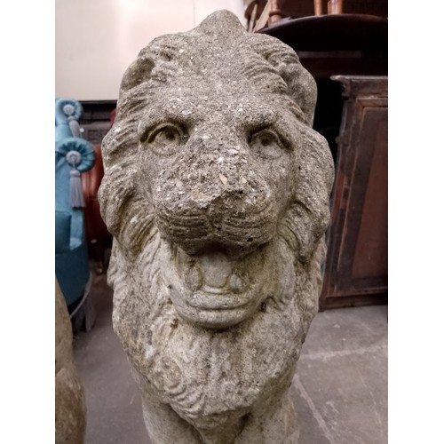 260 - Two garden ornaments in the form of lions.