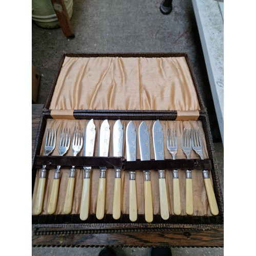 271 - Three canteens of cutlery, one with legs