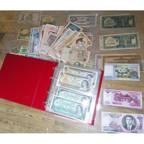 275 - A large collection of assorted world banknotes