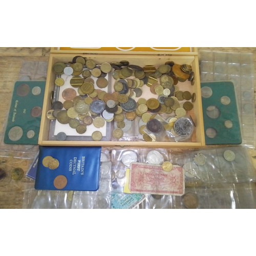 288 - A box of assorted world coins and banknotes