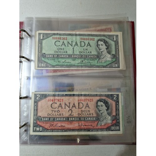 275 - A large collection of assorted world banknotes