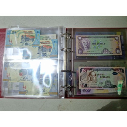 275 - A large collection of assorted world banknotes