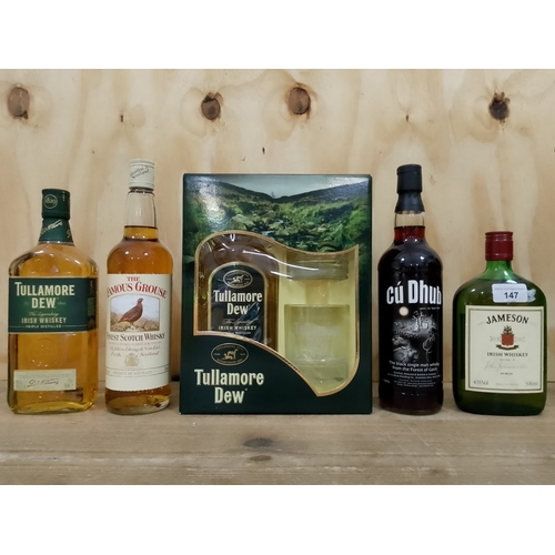 147 - Five bottles of whisky; two 70cl bottles of Tullamore Dew Irish whisky (one in presentation box with... 