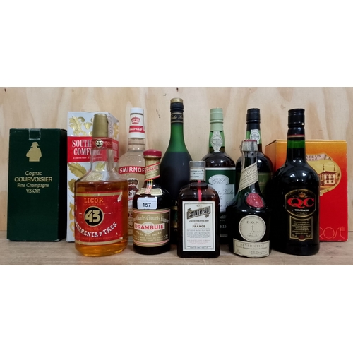 157 - A mixed lot of alcohol comprising Southern Comfort, Courvoisier cognac, Smirnoff vodka, Port, Madeir... 