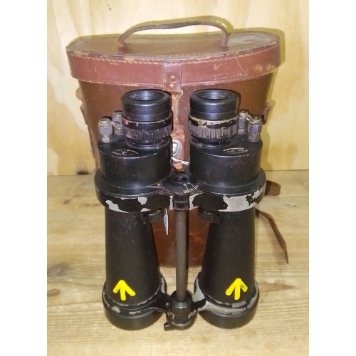 182 - A pair of WWII naval binoculars by Barr & Stroud, leather case.