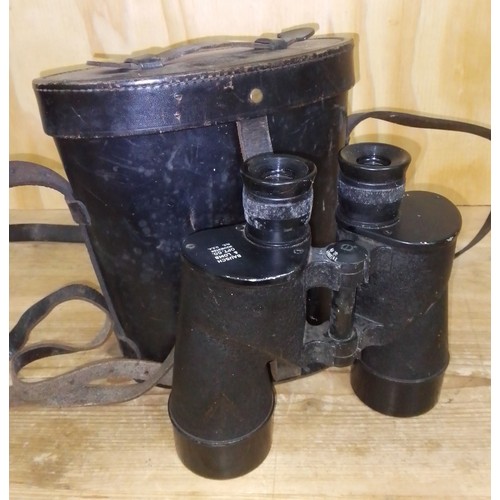 235 - A pair of WWII United States naval 7x50 binoculars by Bausch & Lomb with leather case.