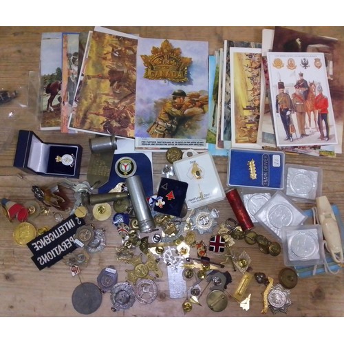 232 - A quantity of badges, buttons, medals etc.