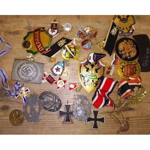 231 - Assorted Russian and German badges and medals etc. mainly post war reproductions.