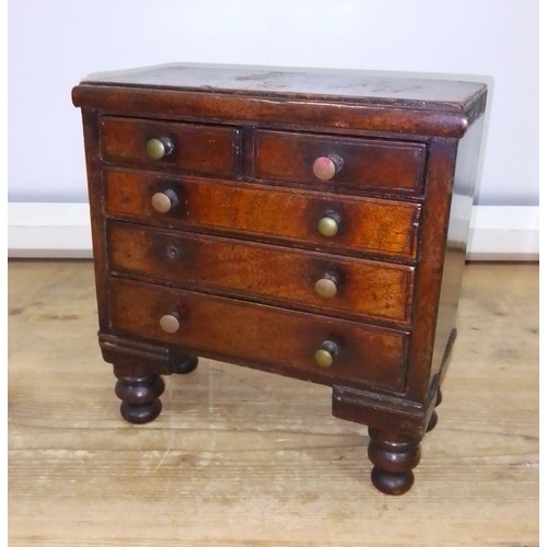 446 - A Victorian 'apprentice' chest of drawers, height 23cm.