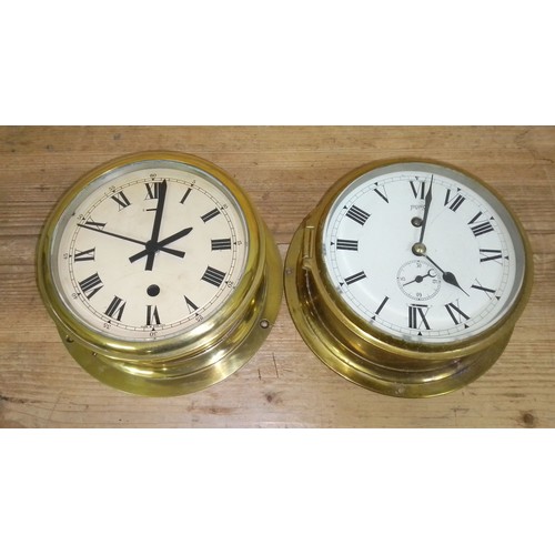 462 - Two ship's bulkhead clocks, diam. 20cm.