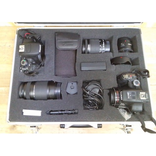 475 - Two digital cameras; Canon 700D and Lumix FZ150, boxed with accessories.