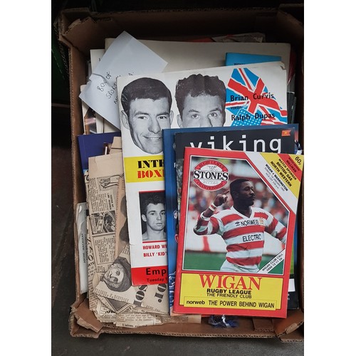 92 - A box of sporting memorabilia including Open Golf programme, German football club pennant, boxing ma... 