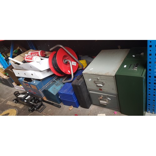 130 - A quantity of garage ware to include 2 ton trolley jack, 2 cable reels, bike parts, metal drawers, c... 
