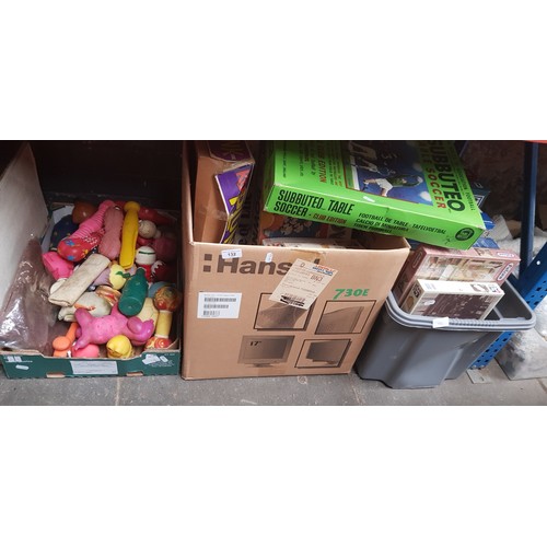 132 - Three boxes of toys and games including jigsaws, Subbuteo and dog chews