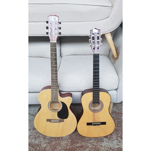 162 - 2 acoustic guitars, 1 by Benson and 1 by Lauren