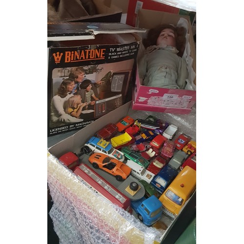 150 - Assorted toys comprising a tray of die-cast model vehicles, a Binatone video game and a German bisqu... 