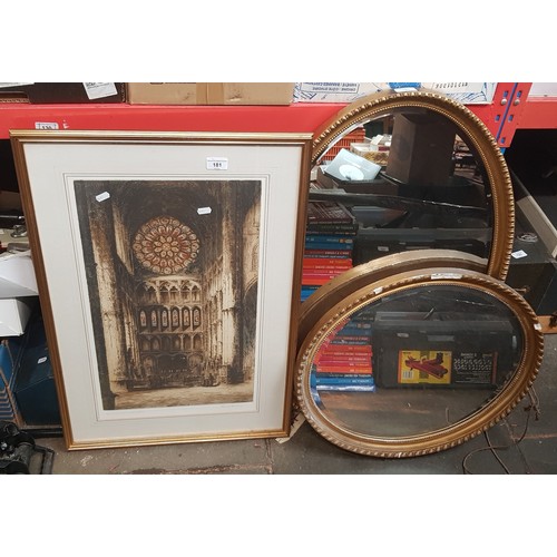 181 - An oval gilt framed mirror and a signed print after Frank Harding depicting the Rose Window Westmins... 