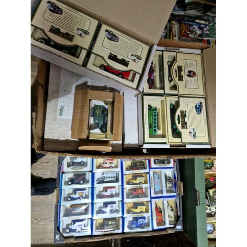 422 - 2 boxes of assorted boxed diecast vehicles to include Oxford (20) & Days Gone (51).