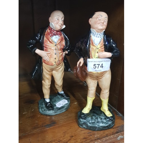 574 - 2 Royal Doulton figures - ‘Micawber’ HN2097 and ‘Pickwick’ HN2099.  Both were produced 	between 1952... 