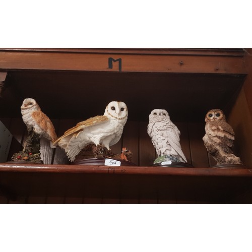 584 - 4 large owls on plinths, three by Country Artists and the other by Brooks & Bentley - largest approx... 