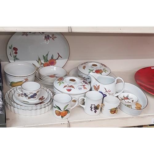 628 - Royal Worcester ‘Evesham’ - 22 items including a large oval platter 32.5cm long, serving items etc.