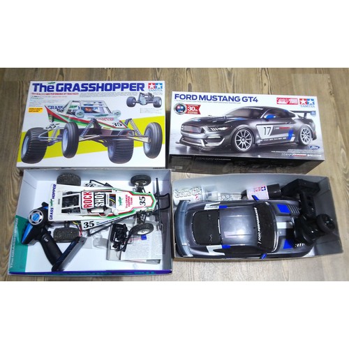 430 - Two Tamiya RC model cars; Grasshopper and Ford Mustang GT4