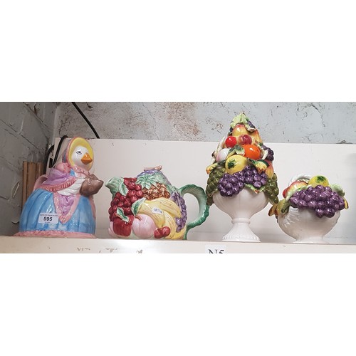 595 - Two novelty teapots and two fruit ornaments