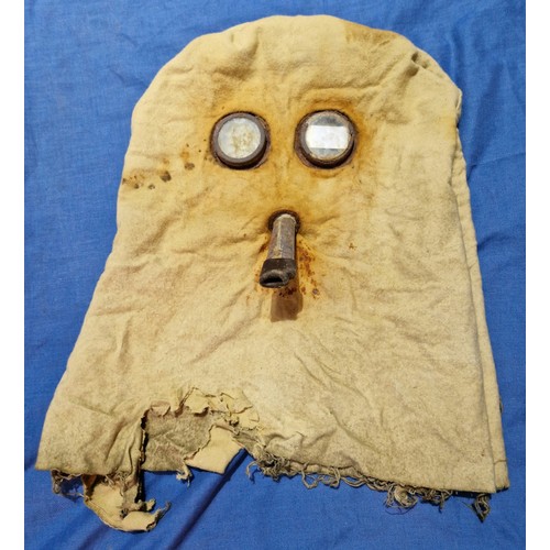 219 - A WWI PH helmet gas mask hood respirator.