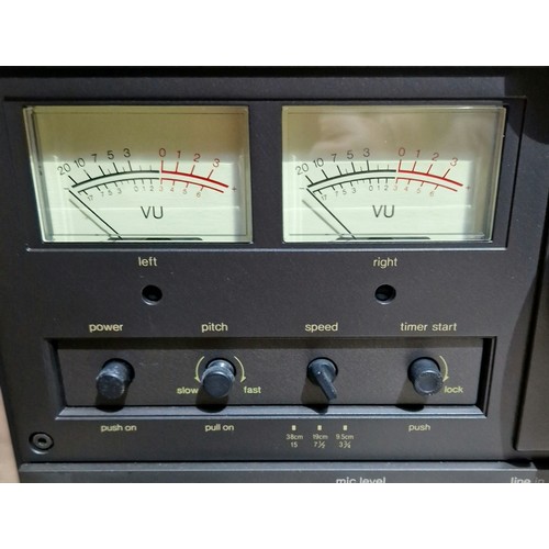 296 - A Technics RS-1506 reel to reel 4 track tape deck.