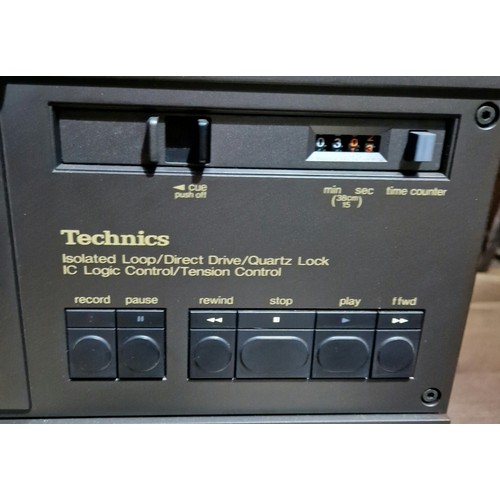 296 - A Technics RS-1506 reel to reel 4 track tape deck.