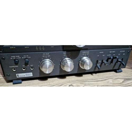 296 - A Technics RS-1506 reel to reel 4 track tape deck.