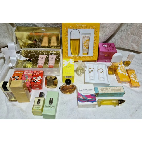 647 - A box of assorted vintage and modern perfumes/lotions.