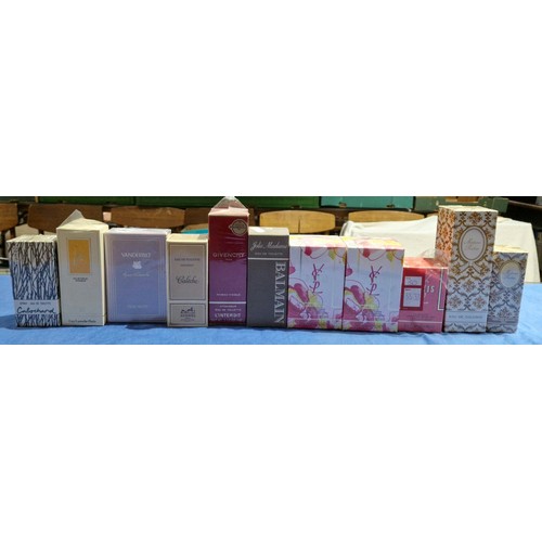 648 - A box of assorted vintage and modern perfumes/lotions.